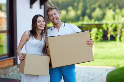 Local moving team handling furniture in Somers Town