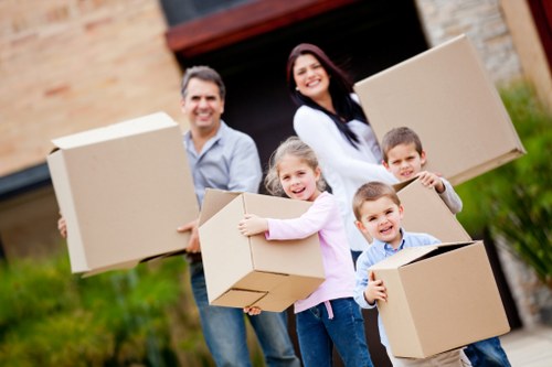 Packed office equipment and furniture ready for a commercial move