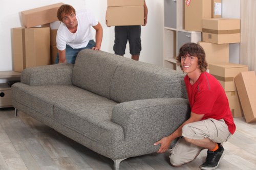 House movers loading furniture for a flat or home move in Somers Town